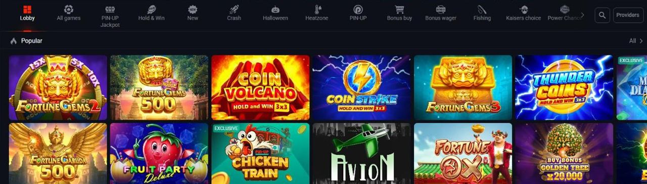 Pin Up Casino lobby with collection tabs and popular slots Fortune Gems 2, Fortune Gems 500, Coin Volcano, Coin Strike and PIN-UP Chicken Train